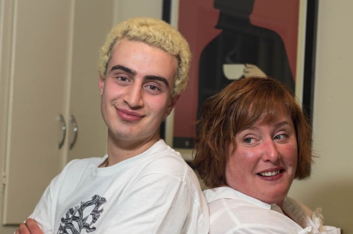 Amie and Elazar pose for a photo
