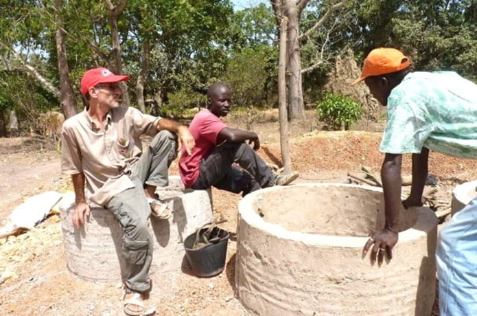 Freddy working to help others with funds raised by It Takes A Village efforts.