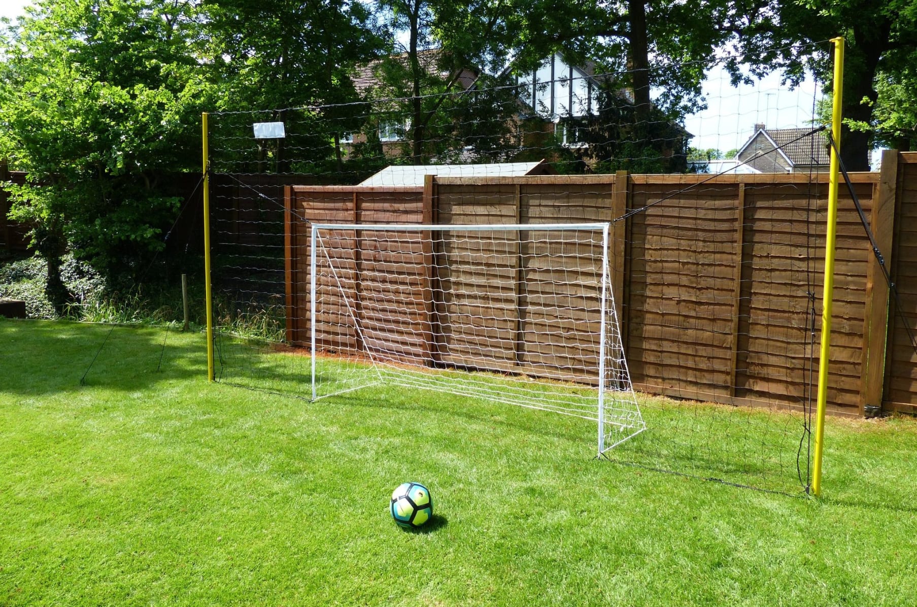 Backyard soccer goal net and rebounder