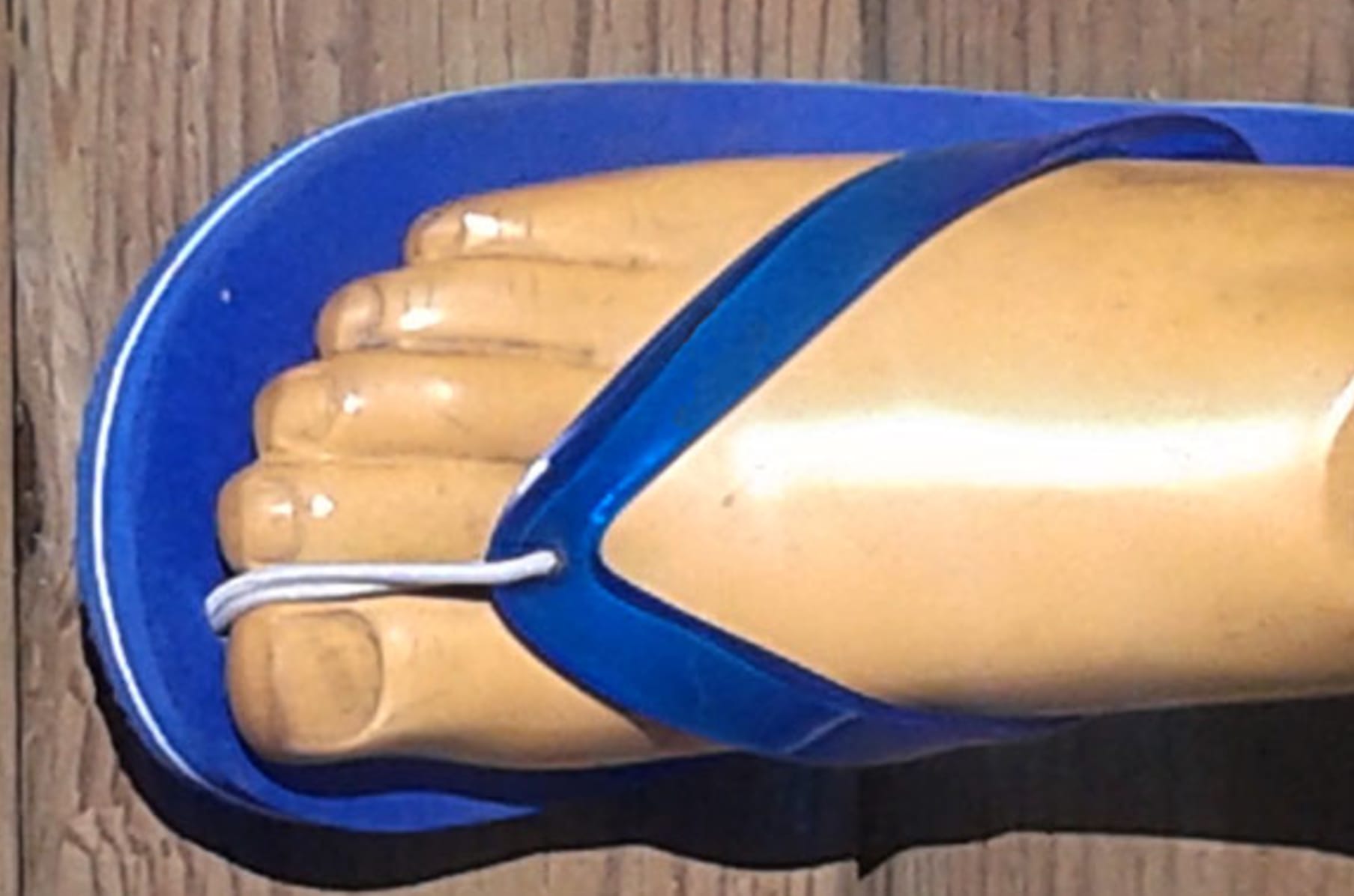 Flip flops with fake toes best sale