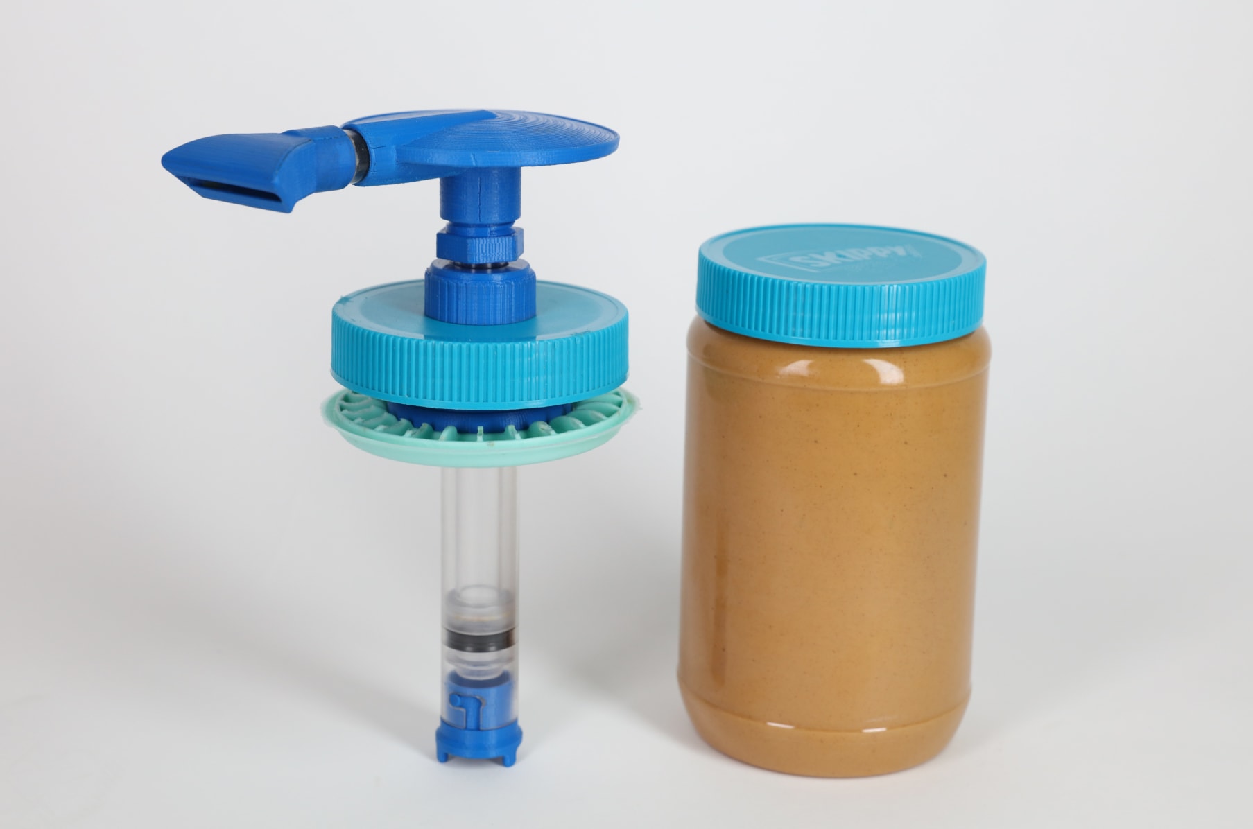 The Spinning Spread Scooper automatically cleans your peanut butter jars  hands-free! 